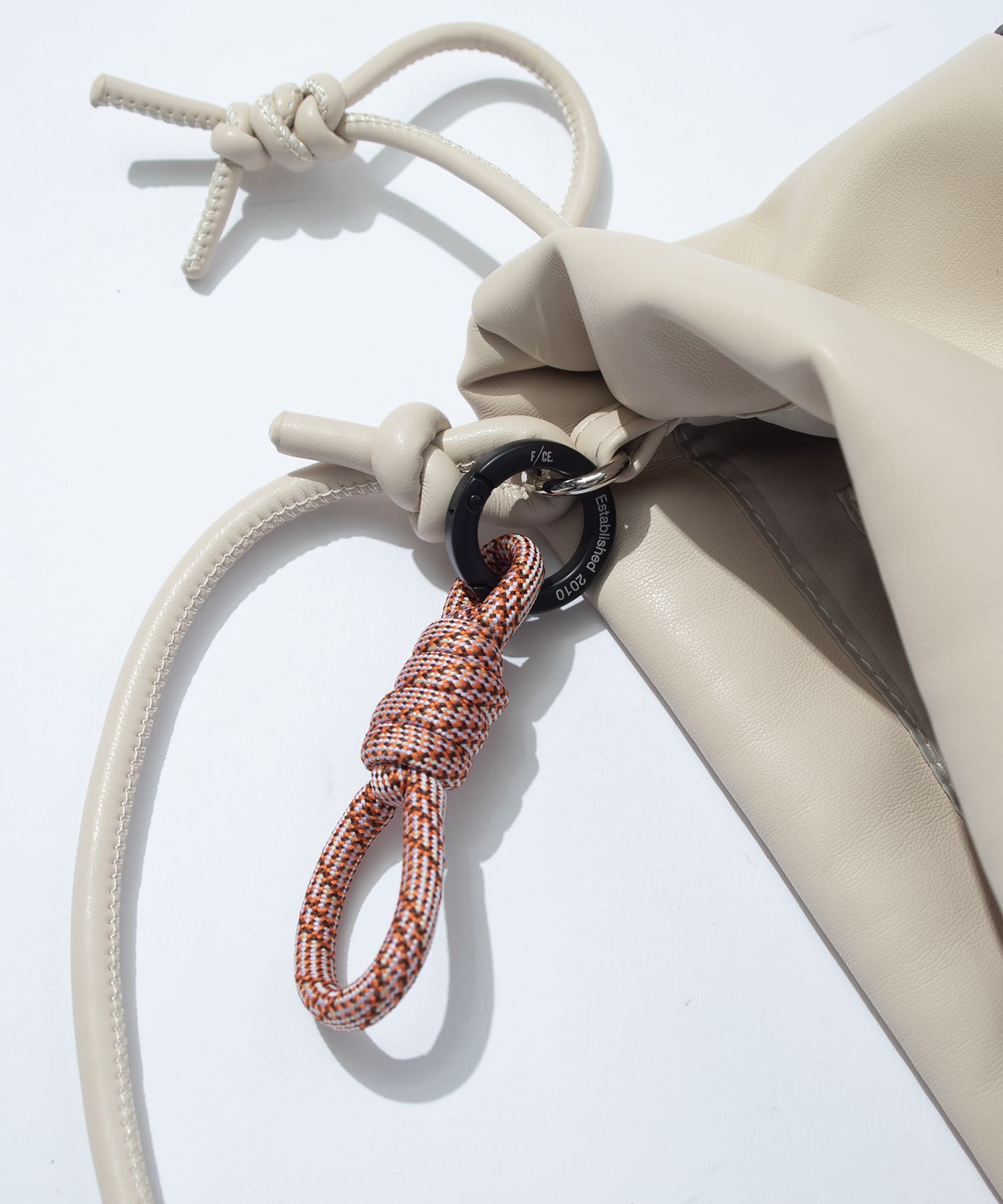 F/CE. / TECH LEATHER DRAWSTRING POCHETTE