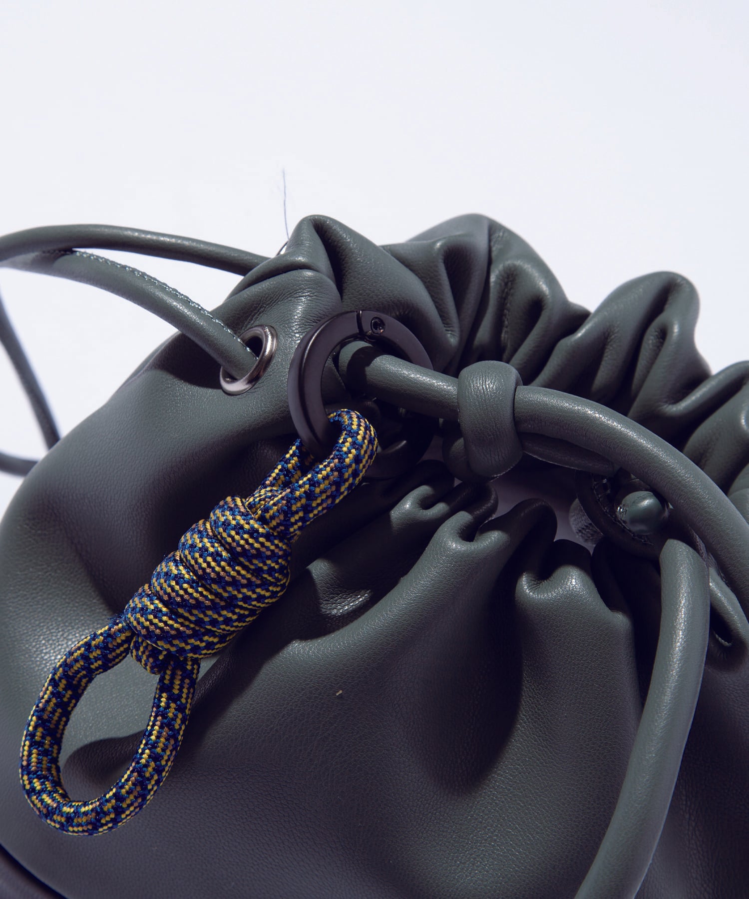 F/CE. / TECH LEATHER DRAWSTRING POCHETTE