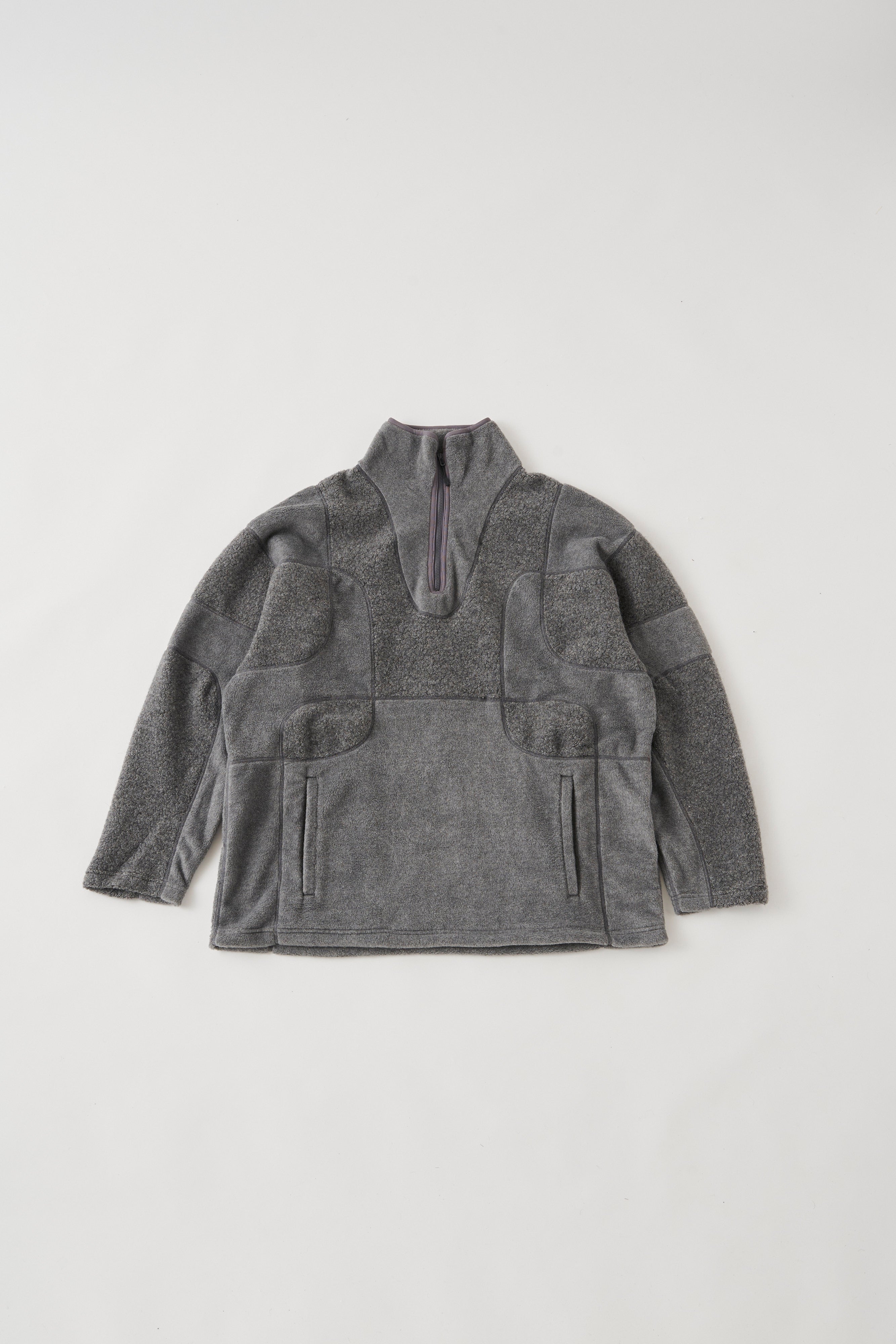 White Mountaineering / PATCHWORK ZIP PULLOVER