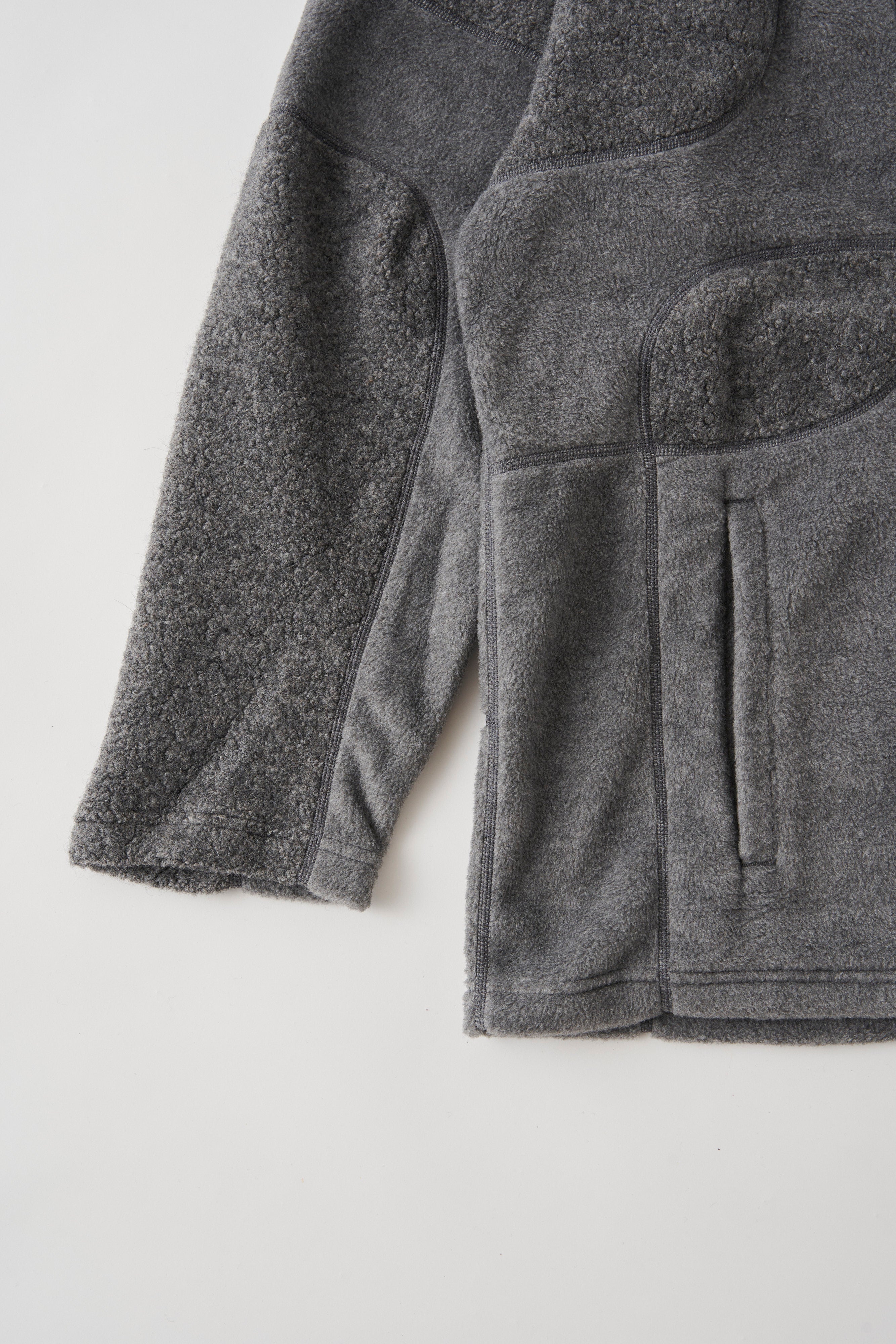 White Mountaineering / PATCHWORK ZIP PULLOVER