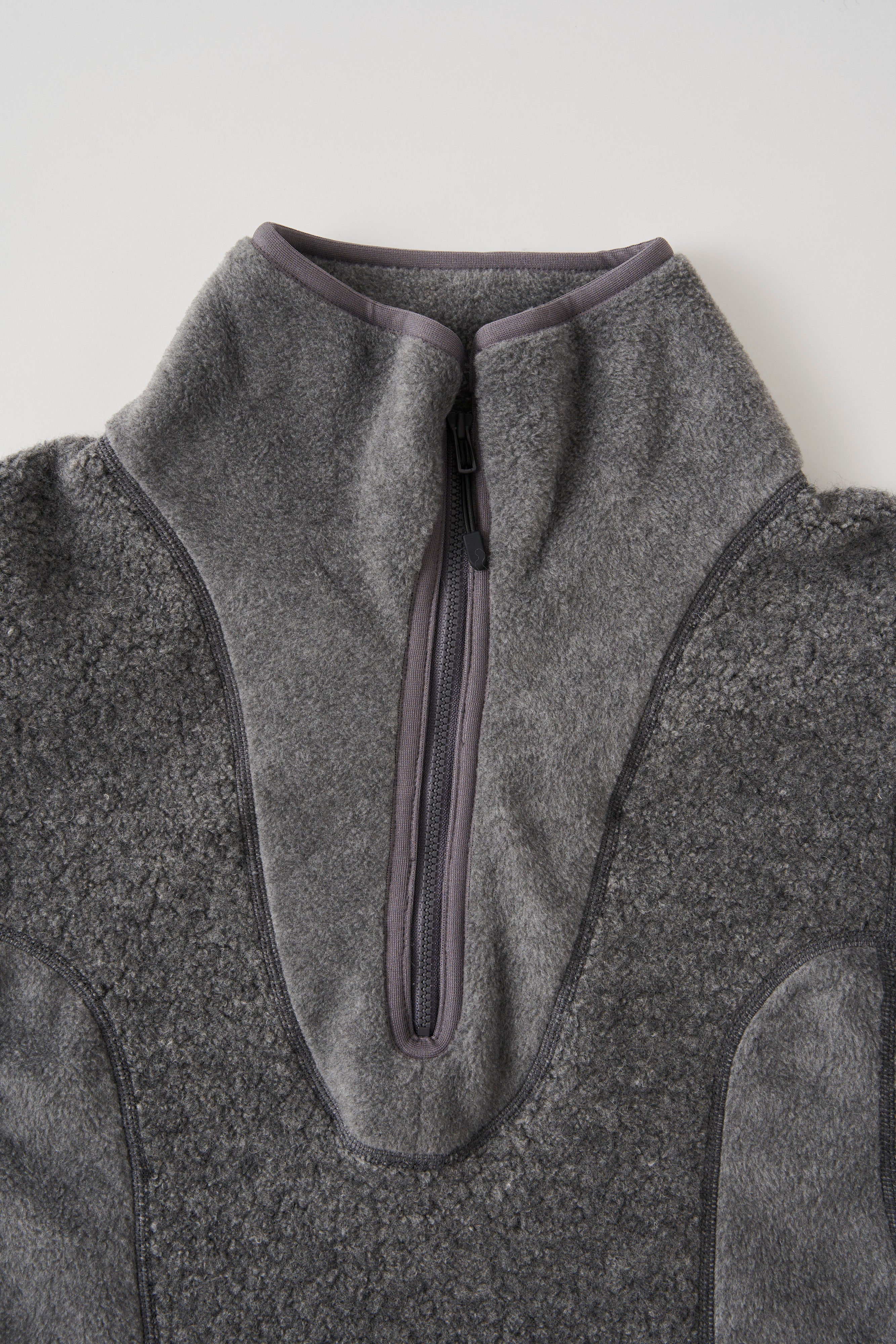 White Mountaineering / PATCHWORK ZIP PULLOVER