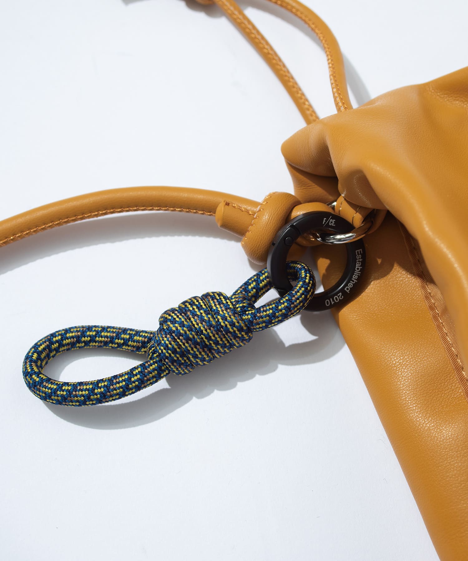 F/CE. / TECH LEATHER DRAWSTRING POCHETTE